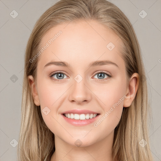 Joyful white young-adult female with long  brown hair and blue eyes