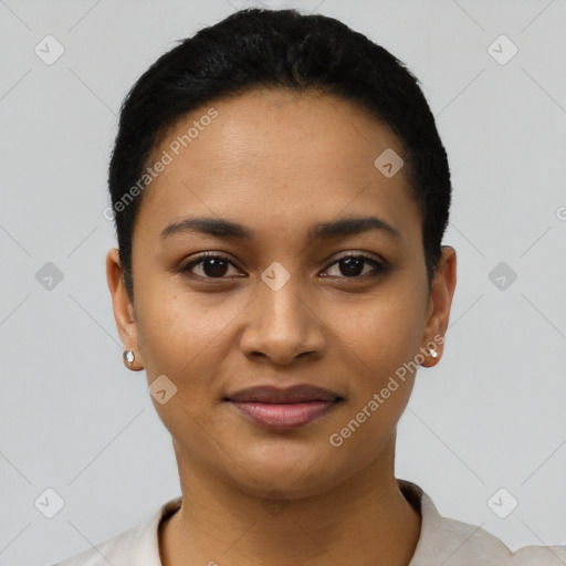 Joyful latino young-adult female with short  black hair and brown eyes