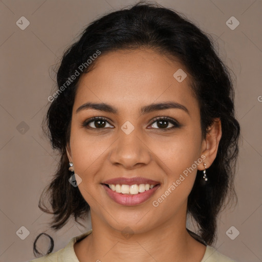 Joyful latino young-adult female with medium  brown hair and brown eyes