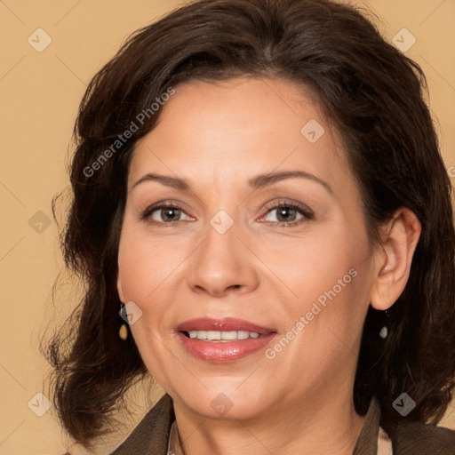 Joyful white adult female with medium  brown hair and brown eyes