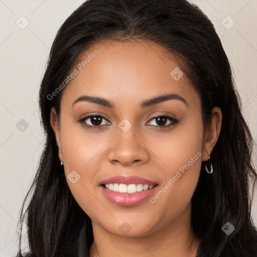 Joyful latino young-adult female with long  brown hair and brown eyes