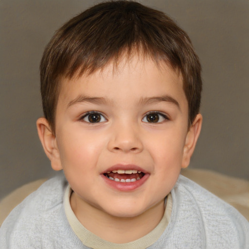 Joyful white child male with short  brown hair and brown eyes