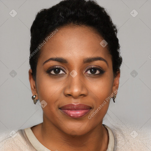 Joyful black young-adult female with short  black hair and brown eyes