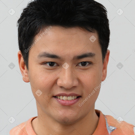 Joyful asian young-adult male with short  brown hair and brown eyes