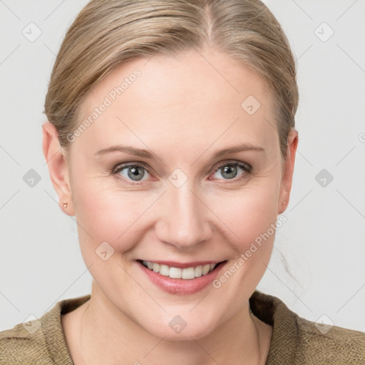 Joyful white young-adult female with medium  brown hair and blue eyes