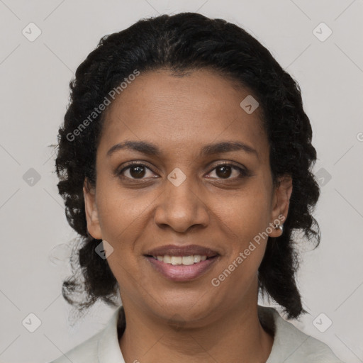 Joyful black young-adult female with medium  black hair and brown eyes