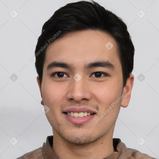 Joyful asian young-adult male with short  black hair and brown eyes