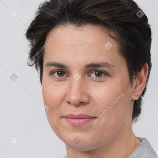 Joyful white adult female with short  brown hair and brown eyes