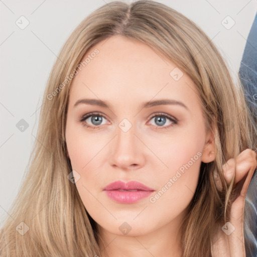 Neutral white young-adult female with long  brown hair and brown eyes