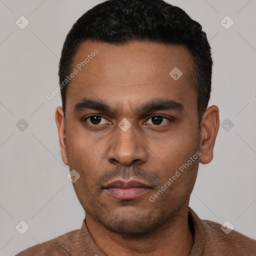 Neutral latino young-adult male with short  black hair and brown eyes
