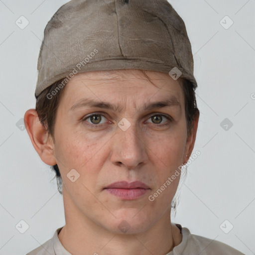 Neutral white adult female with short  brown hair and grey eyes