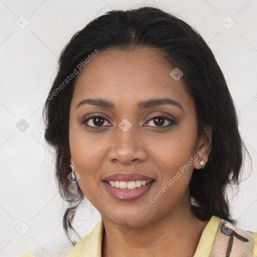 Joyful black young-adult female with medium  brown hair and brown eyes