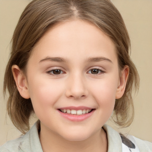 Joyful white child female with medium  brown hair and brown eyes