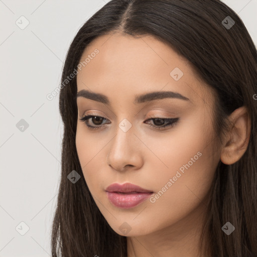 Neutral white young-adult female with long  brown hair and brown eyes