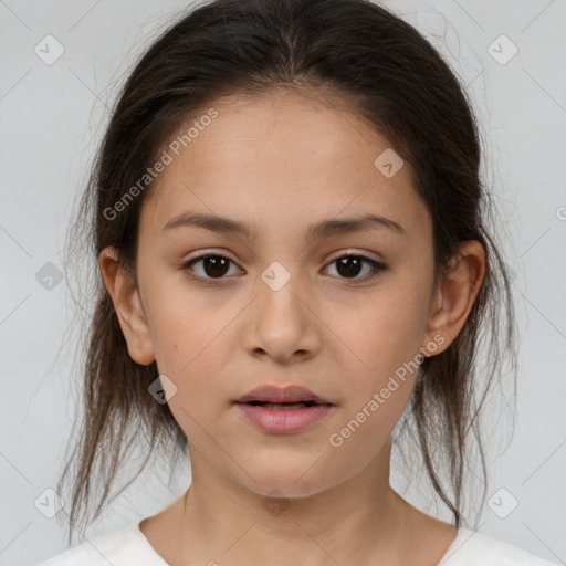 Joyful white child female with medium  brown hair and brown eyes