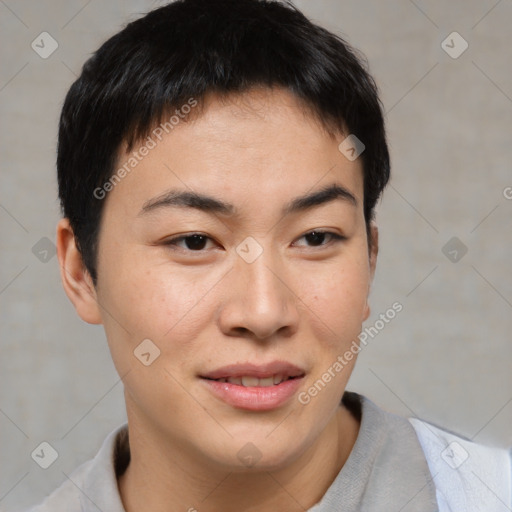 Joyful asian young-adult male with short  brown hair and brown eyes