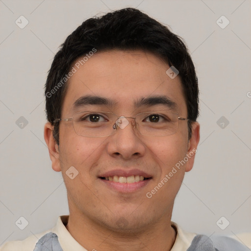 Joyful asian young-adult male with short  brown hair and brown eyes