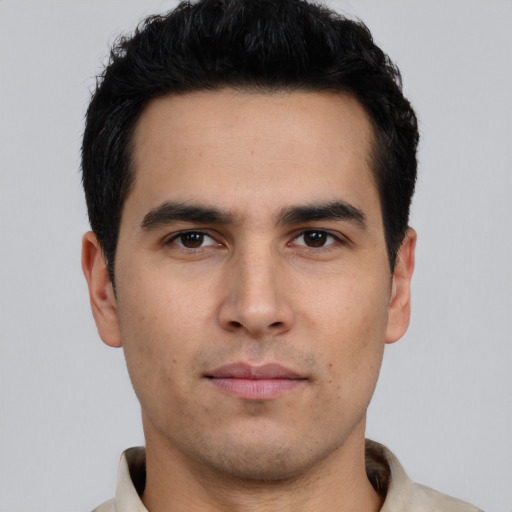 Neutral white young-adult male with short  black hair and brown eyes