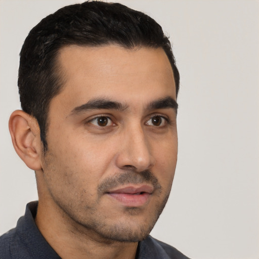 Neutral latino young-adult male with short  black hair and brown eyes