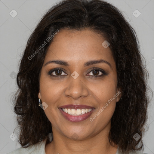 Joyful black young-adult female with medium  brown hair and brown eyes