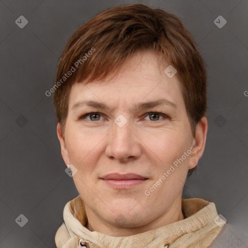 Joyful white adult male with short  brown hair and grey eyes