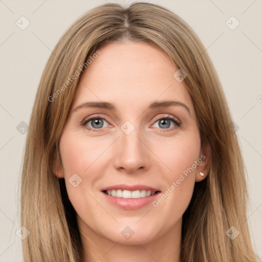 Joyful white young-adult female with long  brown hair and green eyes