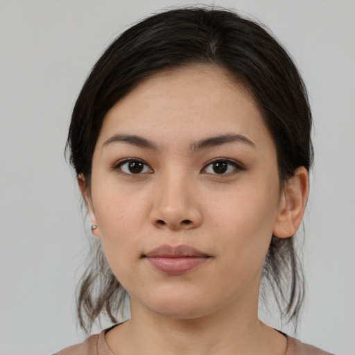 Neutral asian young-adult female with medium  brown hair and brown eyes