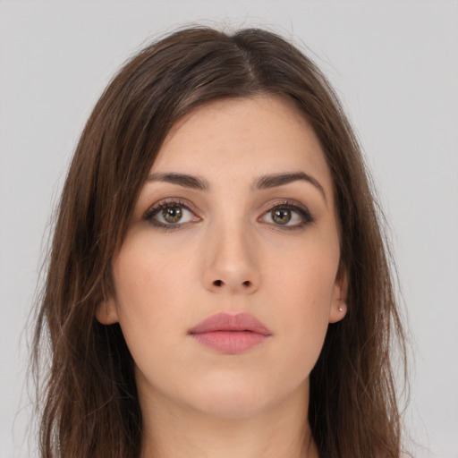 Neutral white young-adult female with long  brown hair and brown eyes