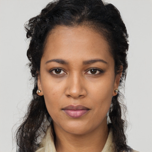 Neutral black young-adult female with long  black hair and brown eyes