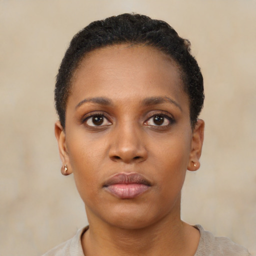 Neutral black young-adult female with short  black hair and brown eyes