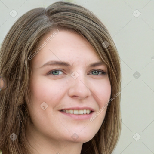 Joyful white young-adult female with long  brown hair and green eyes