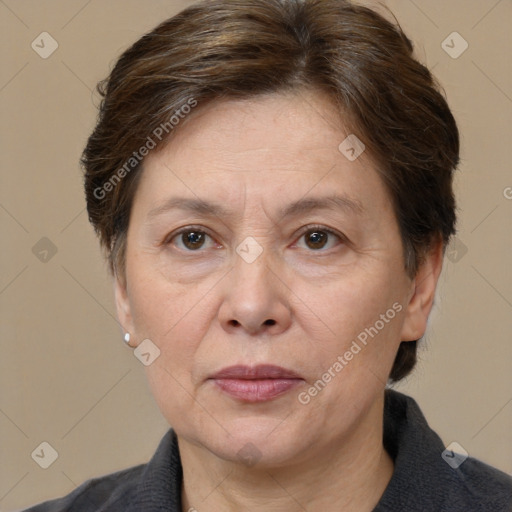 Joyful white adult female with short  brown hair and brown eyes