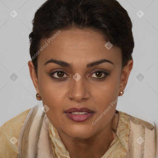 Joyful black young-adult female with short  brown hair and brown eyes