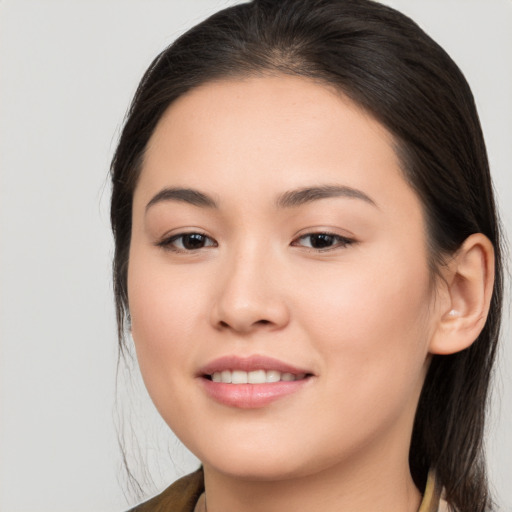 Joyful white young-adult female with medium  brown hair and brown eyes