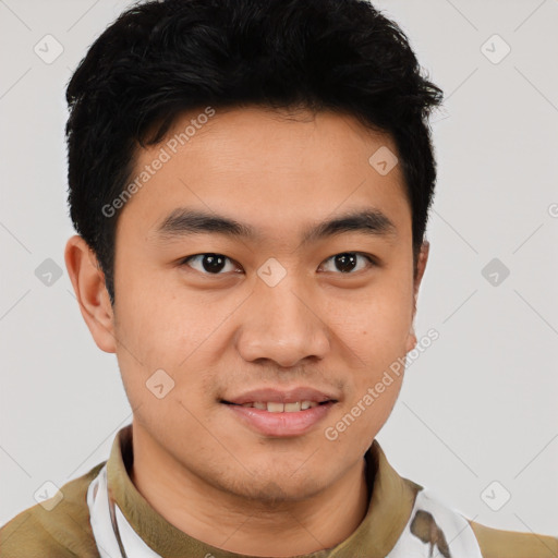 Joyful latino young-adult male with short  brown hair and brown eyes