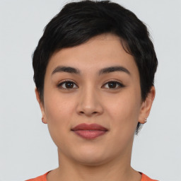 Joyful asian young-adult female with short  black hair and brown eyes