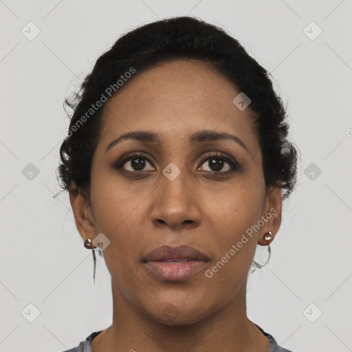 Neutral black young-adult female with short  brown hair and brown eyes