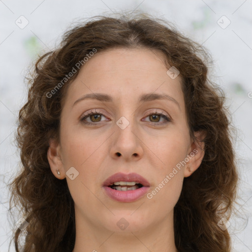 Joyful white young-adult female with long  brown hair and green eyes