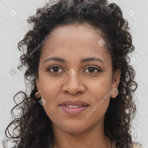 Joyful black young-adult female with long  brown hair and brown eyes