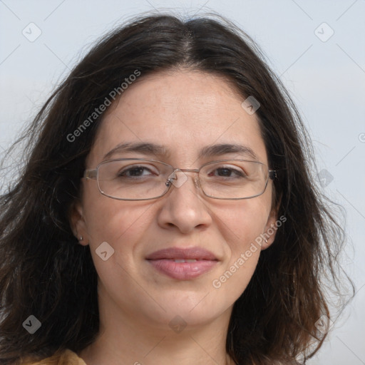 Joyful white adult female with long  brown hair and brown eyes