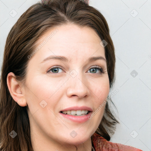 Joyful white young-adult female with long  brown hair and blue eyes