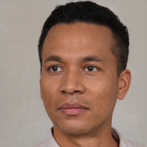 Neutral black young-adult male with short  black hair and brown eyes