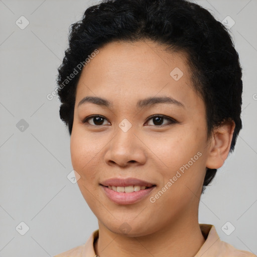 Joyful asian young-adult female with short  black hair and brown eyes