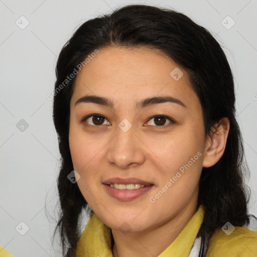 Joyful latino young-adult female with medium  brown hair and brown eyes