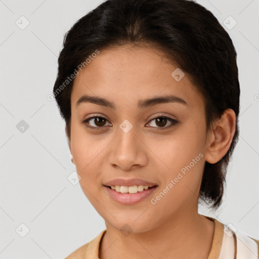 Joyful latino young-adult female with short  brown hair and brown eyes