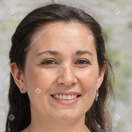 Joyful white adult female with medium  brown hair and brown eyes