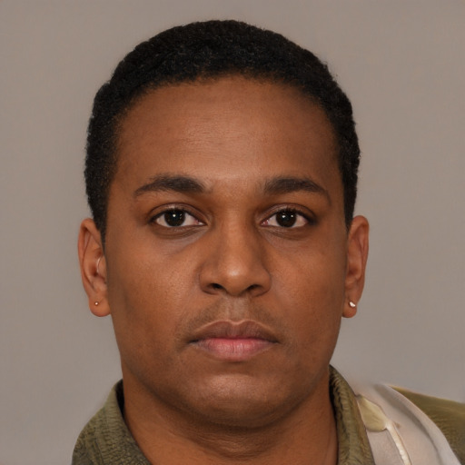 Neutral latino young-adult male with short  brown hair and brown eyes