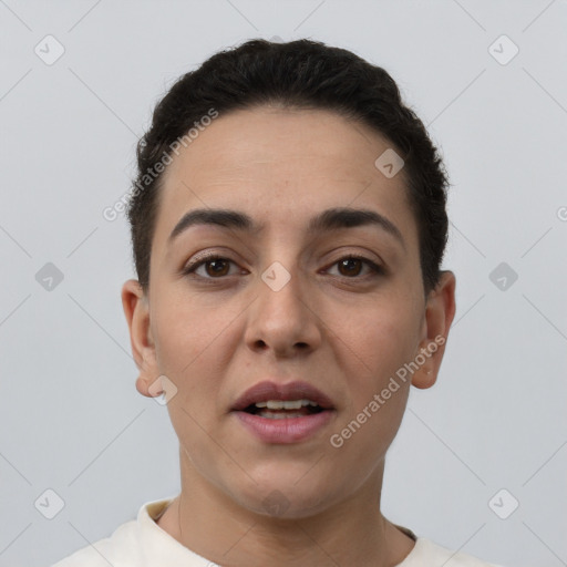 Joyful white young-adult female with short  brown hair and brown eyes