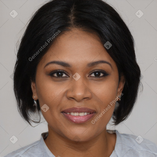 Joyful black young-adult female with medium  brown hair and brown eyes