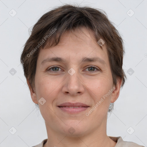 Joyful white adult female with short  brown hair and brown eyes